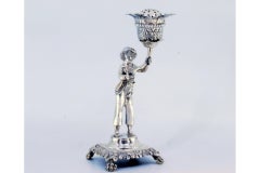 Silver toothpick holder with boy holding flower