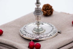 Silver toothpick holder with bulb on leafed plant on three claw feet