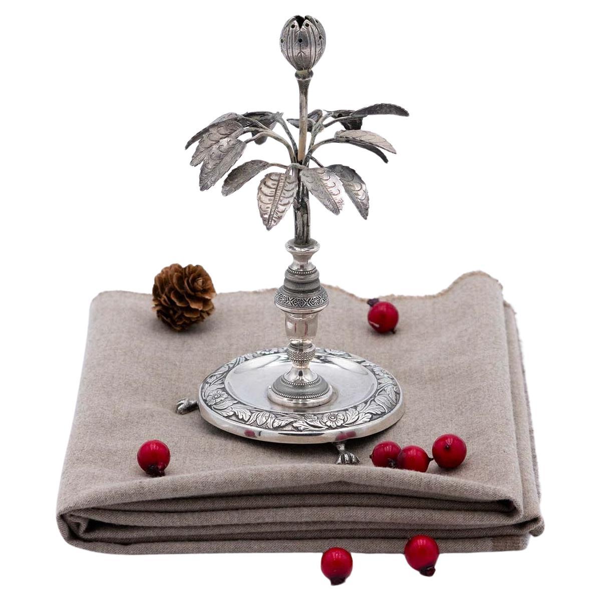 Silver toothpick holder with bulb on leafed plant on three claw feet