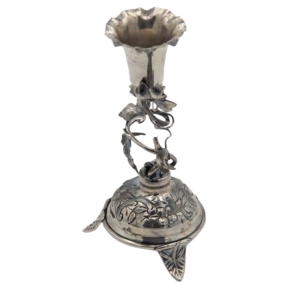 Silver toothpick holder with chalice on a pitcher