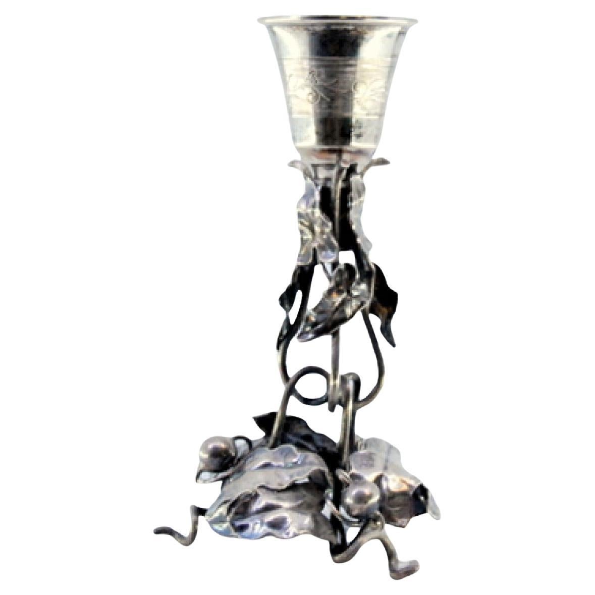 Silver toothpick holder with chalice resting on vine