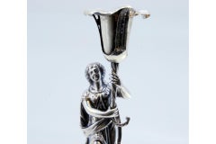 Silver toothpick holder with female figure holding tulip on base with masks