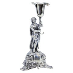 Silver toothpick holder with female figure holding tulip on base with masks