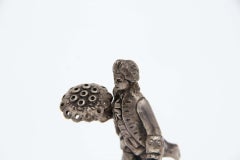 Silver toothpick holder with gentleman and bouquet of flowers