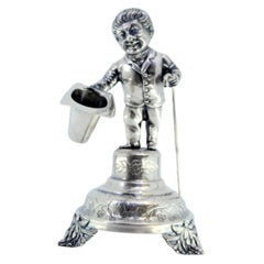 Silver toothpick holder with gentleman in greeting on plinth