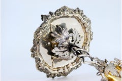 Silver toothpick holder with golden chalice on acanthus