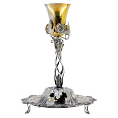 Silver toothpick holder with golden chalice on acanthus