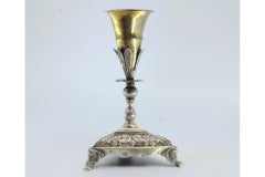 Silver toothpick holder with golden chalice on flower on triangular base
