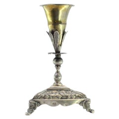 Silver toothpick holder with golden chalice on flower on triangular base