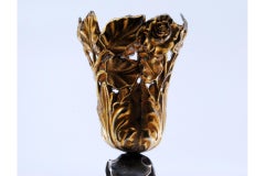 Silver toothpick holder with golden chalice resting on a vine and a cut-out base