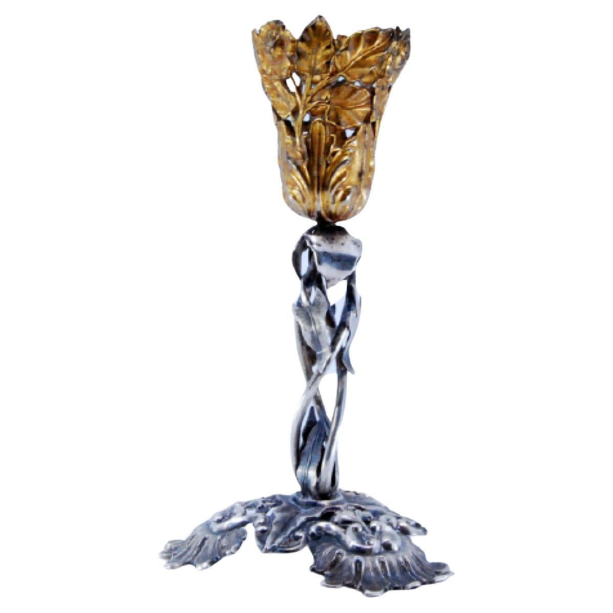 Silver toothpick holder with golden chalice resting on a vine and a cut-out base