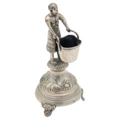 Silver toothpick holder with indigenous people and carrying basket