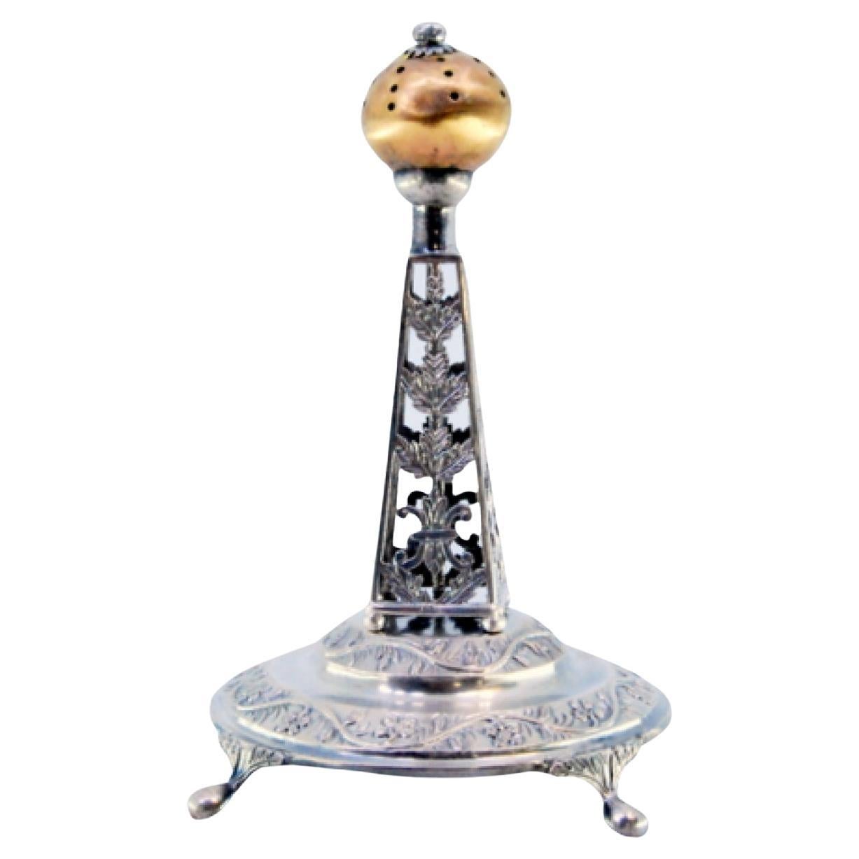 Silver toothpick holder with obelisk-shaped cutout structure