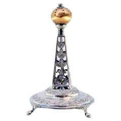 Silver toothpick holder with obelisk-shaped cutout structure