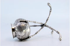 Silver toothpick holder with pot supported by bamboo canes on three legs