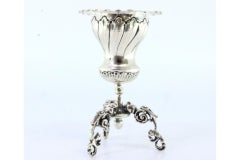 Silver toothpick holder with reliefs on three tall openwork feet & applications