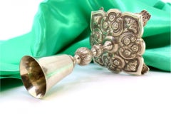 Silver toothpick holder with reliefs, smooth chalice resting on a base