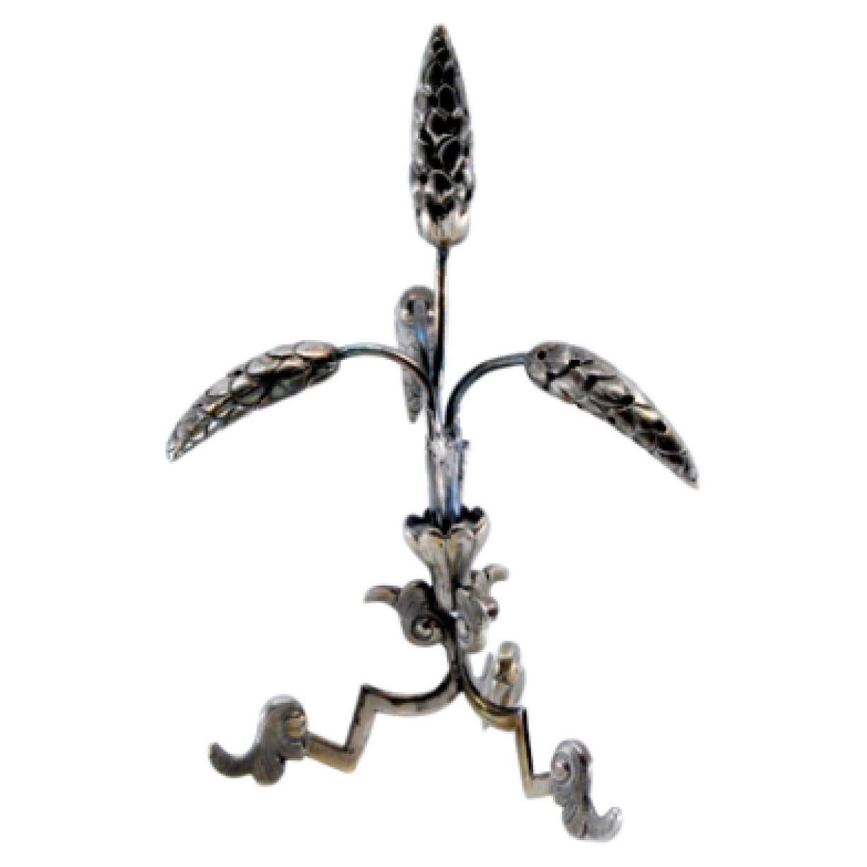 Silver toothpick holder with spikes and resting on a tripod base For Sale