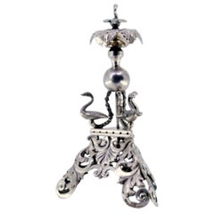 Silver toothpick holder with swans on plinth and acanthus flower on tripod base