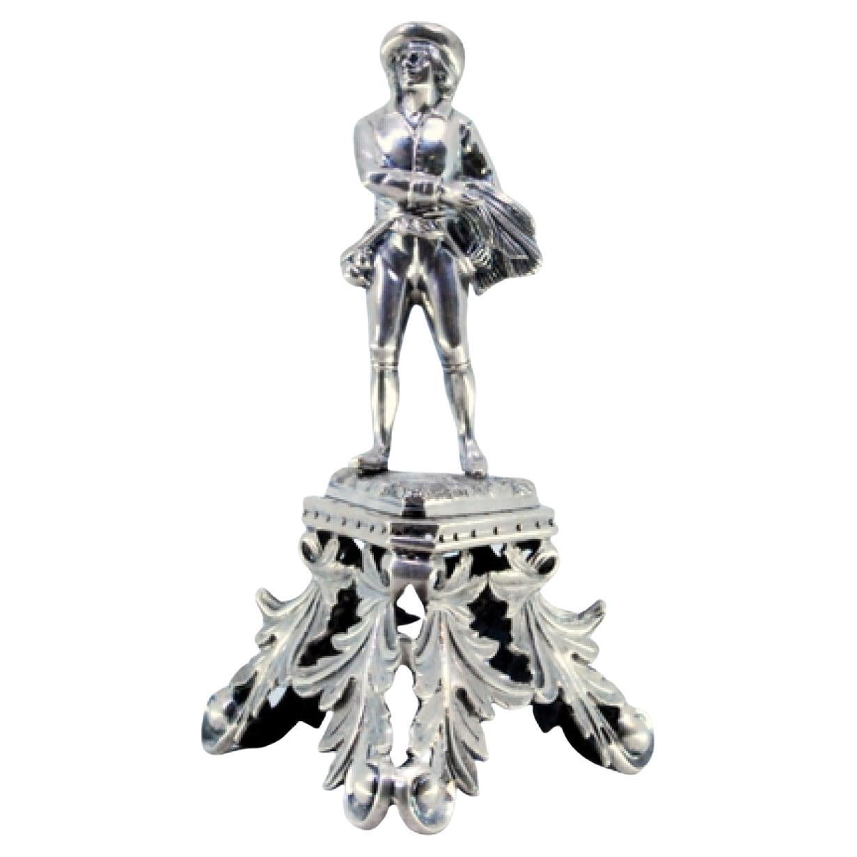 Silver toothpick holder with troubadour on pedestal