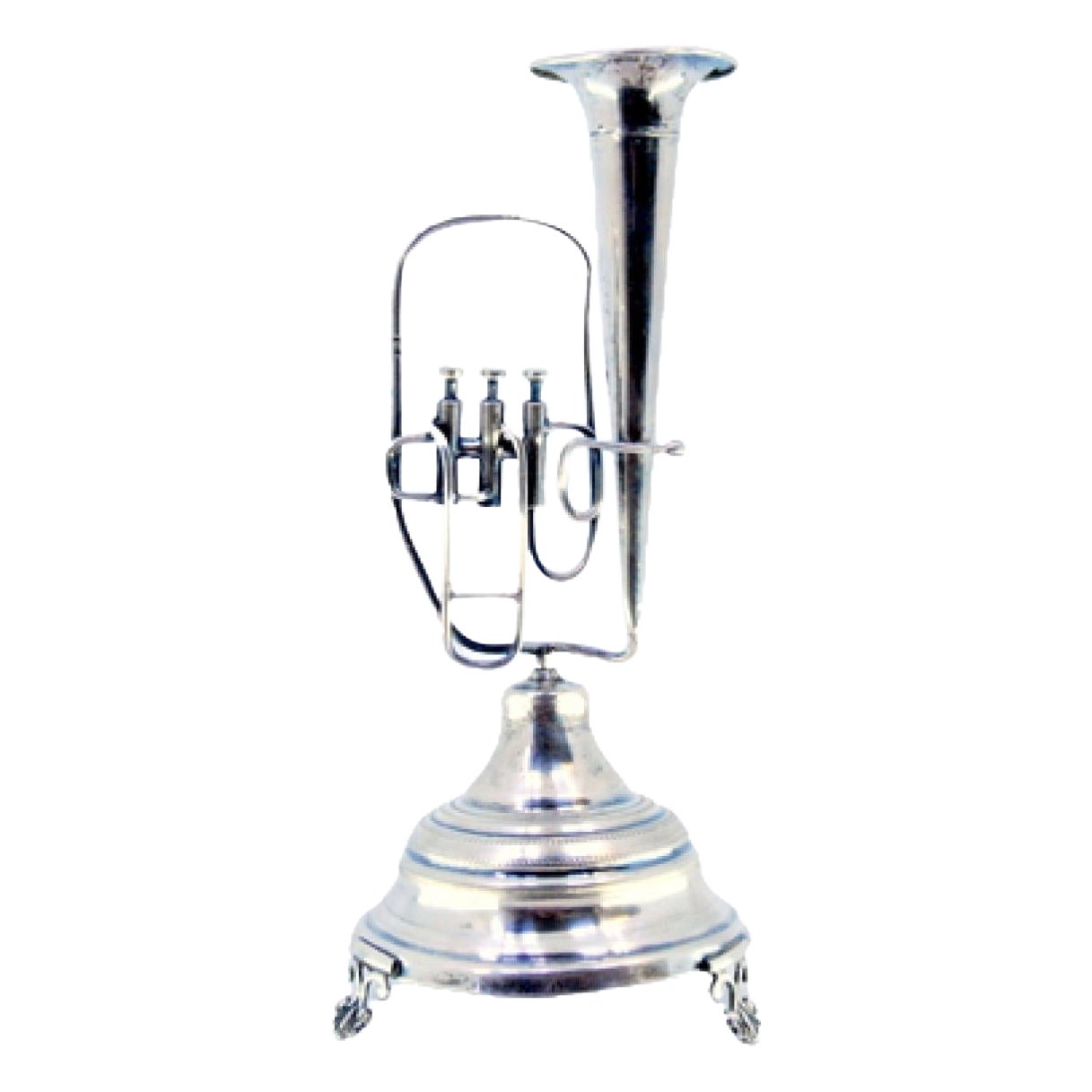 Silver toothpick holder with tuba on pedestal and three leaf-shaped feet