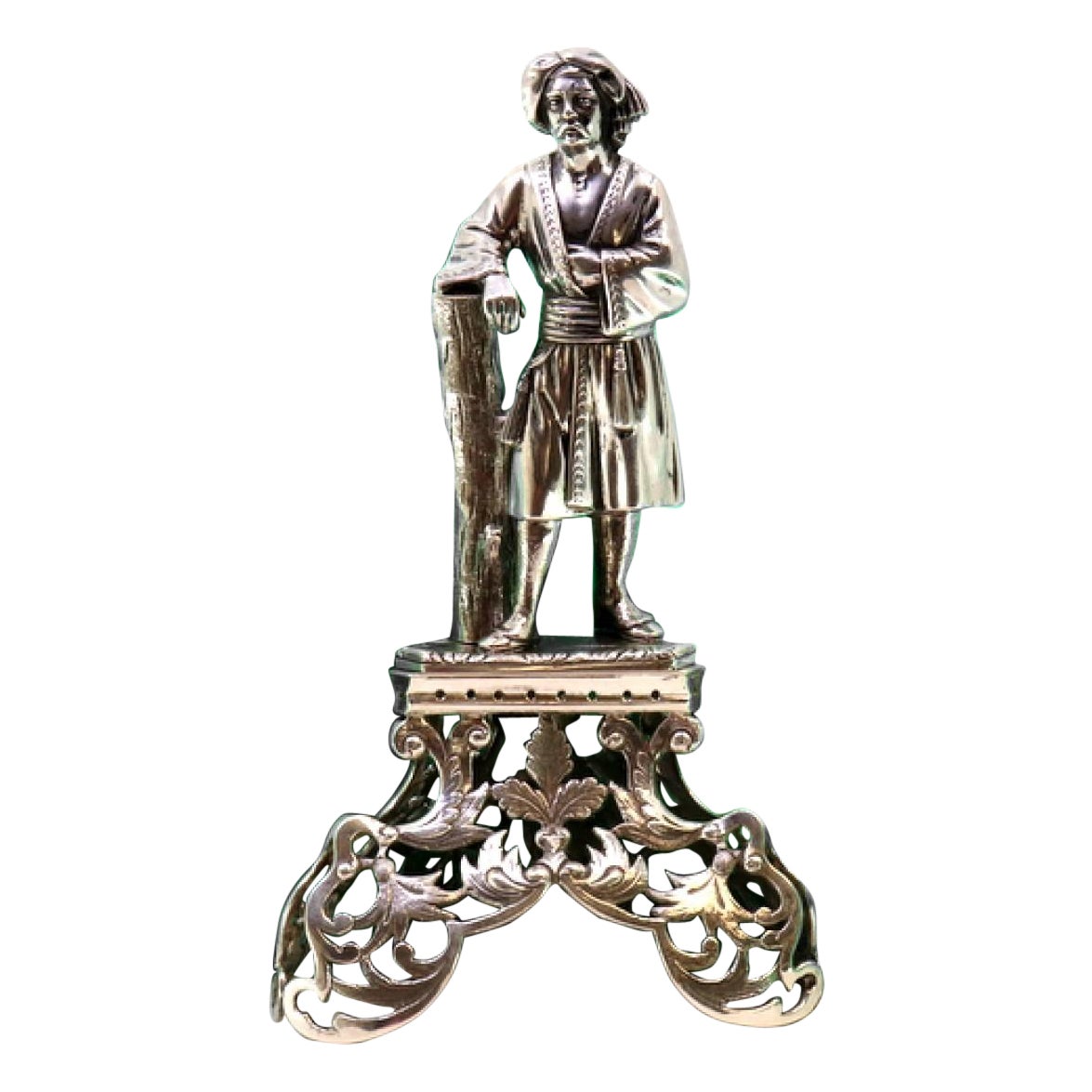 Silver toothpick holder with Turkish nobleman on carved tripod pedestal on trunk For Sale