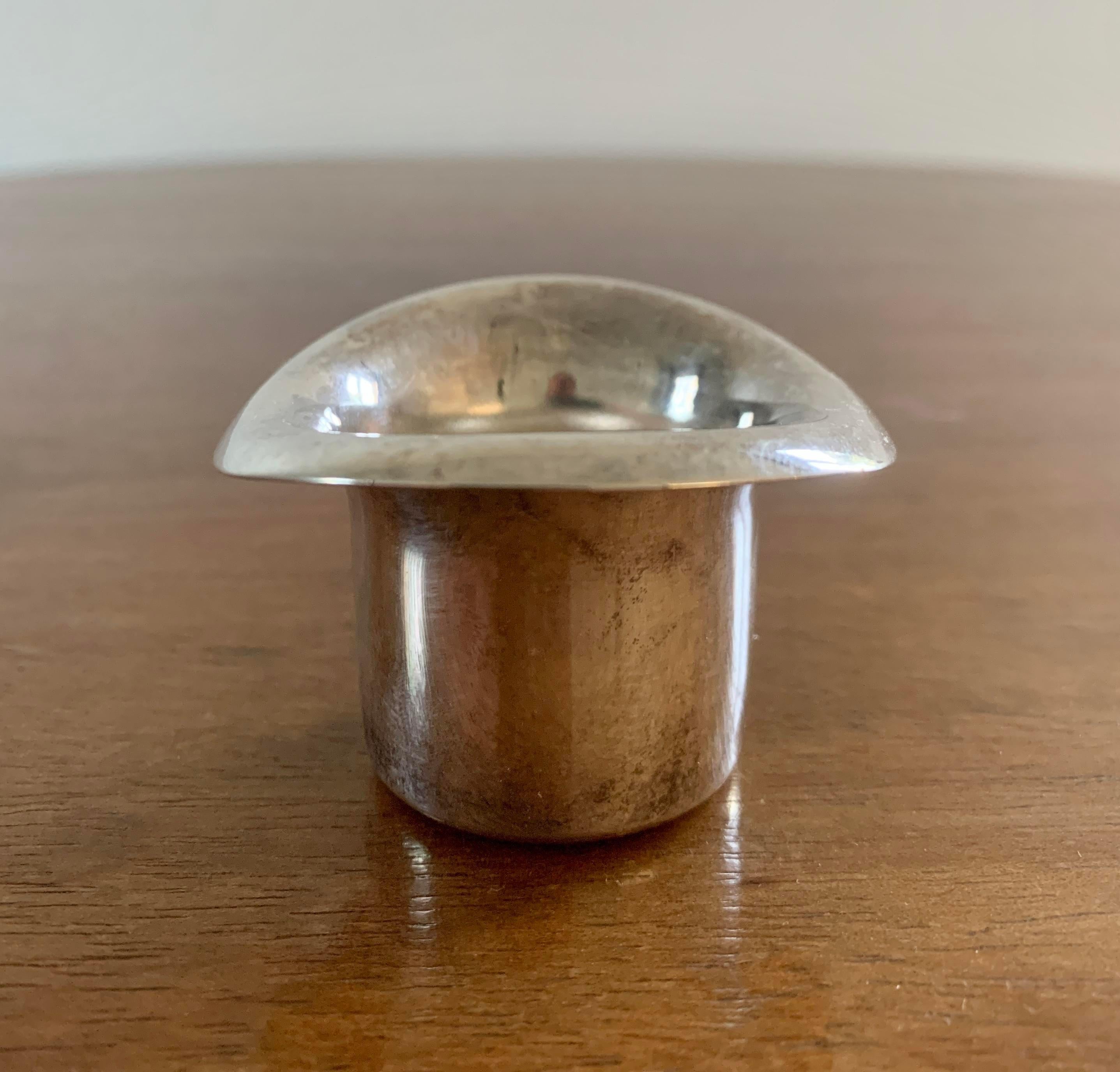 A charming silver cocktail pick or toothpick holder shaped as a top hat

Circa 1950s

Measures: 2.63
