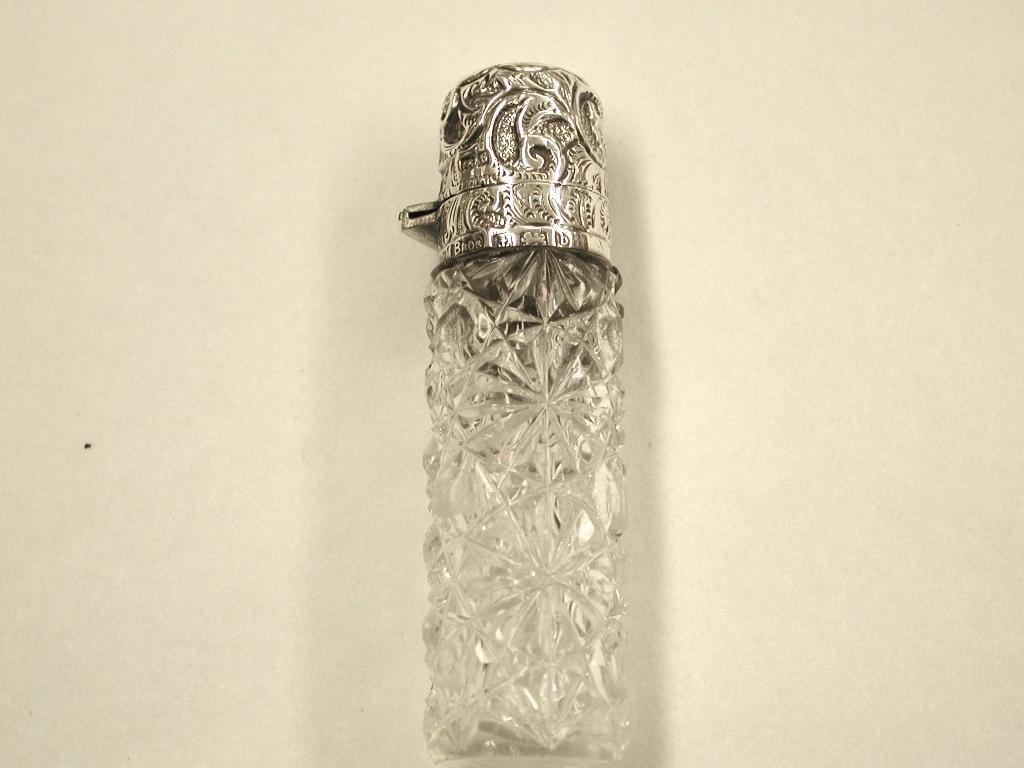Silver topped cut glass scent bottle, dated 1901, Mappin Brothers, Birmingham
Beautiful embossed silver top on lovely multi-cut glass body.