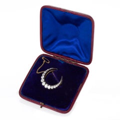 Silver-Topped Gold and Diamond Crescent Moon Brooch