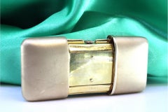 Silver travel watch with gold mechanical movement