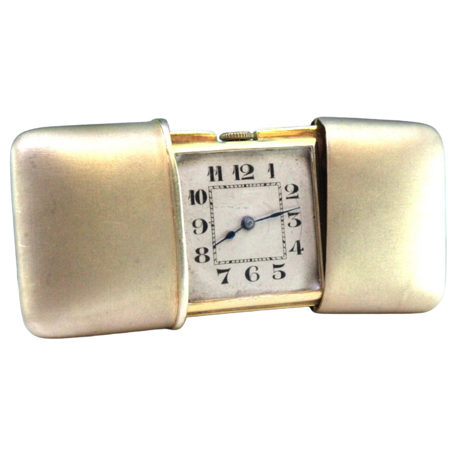 Silver travel watch with gold mechanical movement