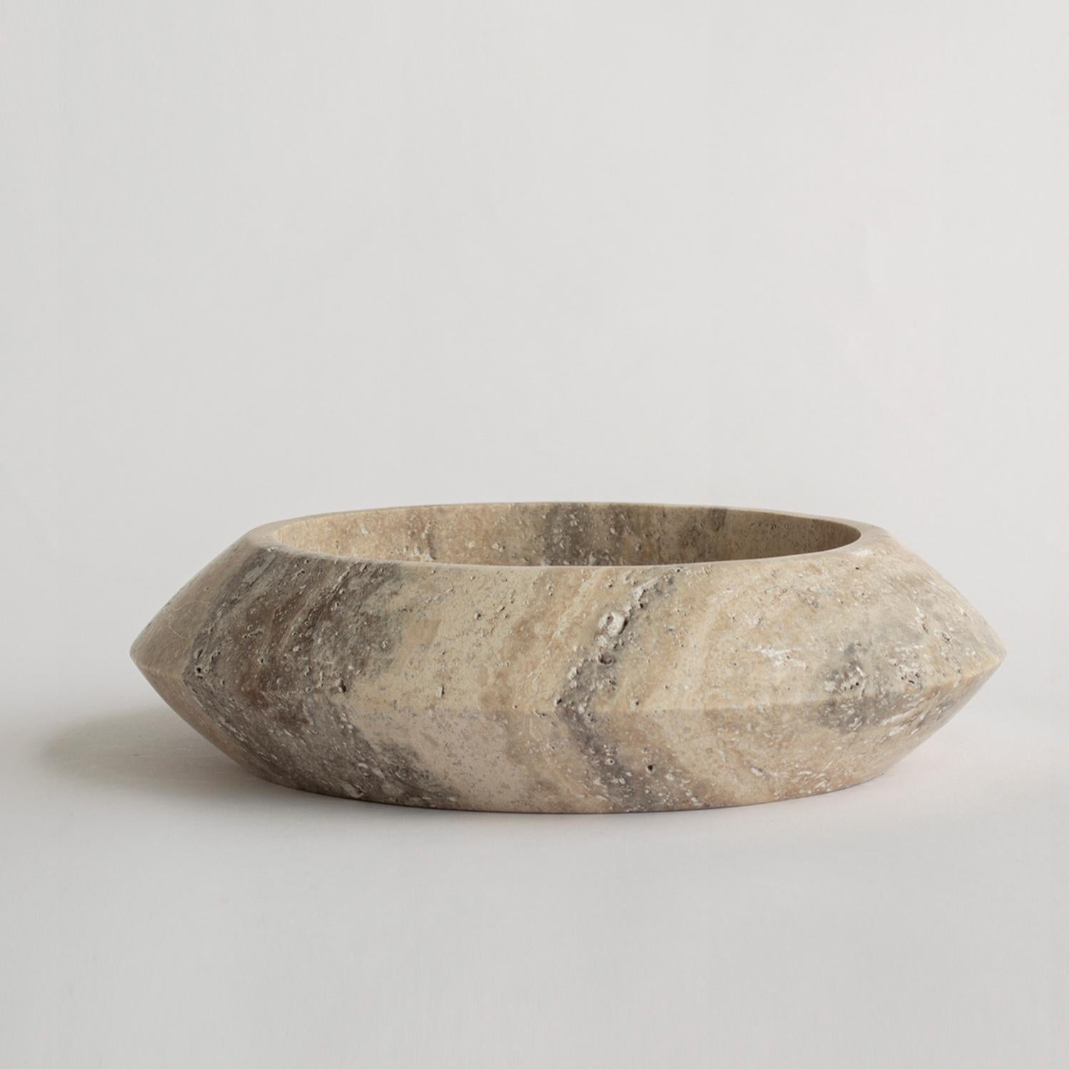 Stunning, aesthetic, timeless are words that can be used to describe this elegant and modern travertine Eclipse bowl from Kiwano. Expertly crafted and finished by hand, our travertine bowls are a study in sculptural simplicity. Natural variations in