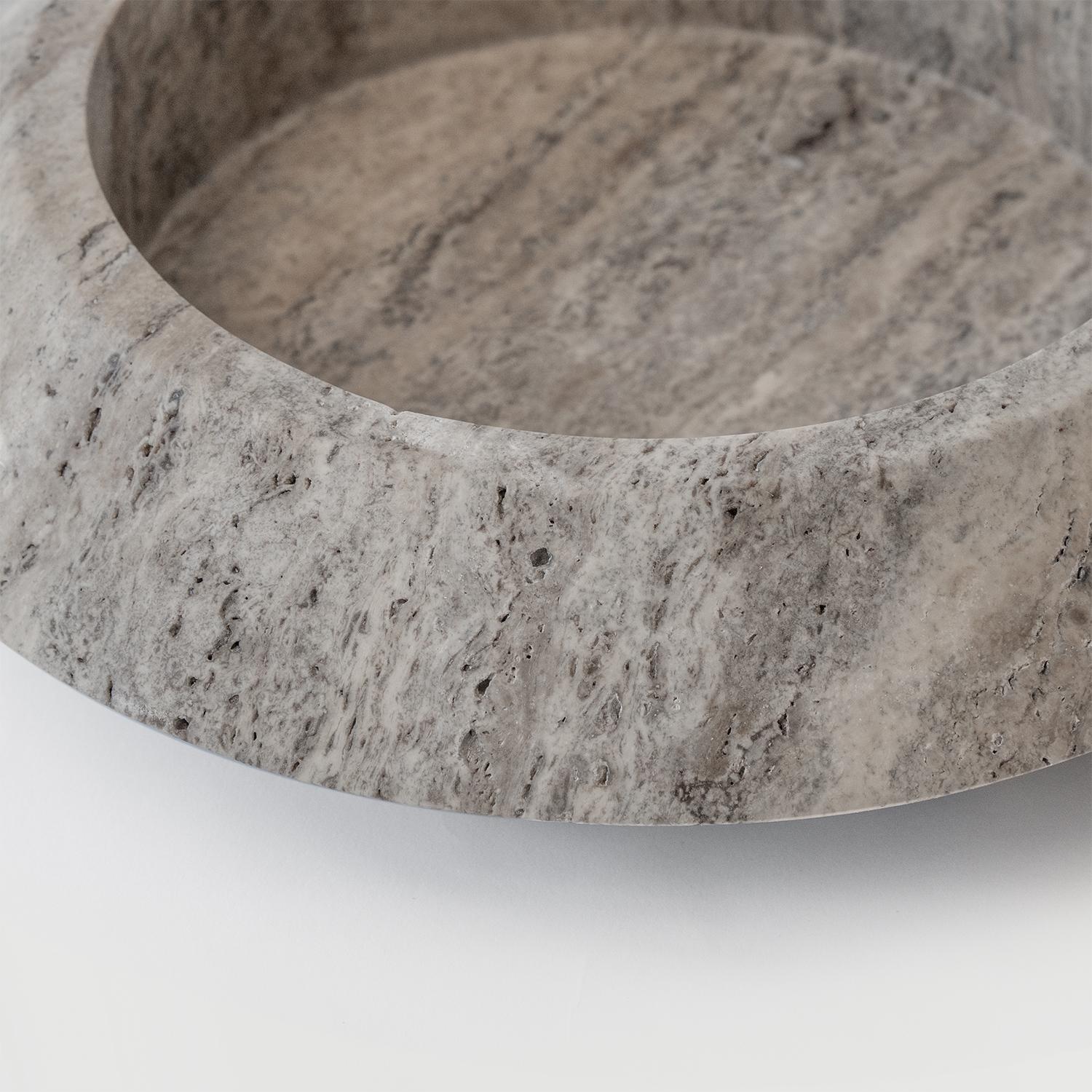 Stunning, aesthetic, timeless are words that can be used to describe this elegant and modern silver travertine Eclipse xl bowl from Kiwano. Expertly crafted and finished by hand, our travertine bowls are a study in sculptural simplicity. Natural