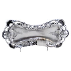 Silver tray and scissors with floral and shell motifs