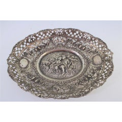 Silver tray, cut and embossed, with a couple in a country scene