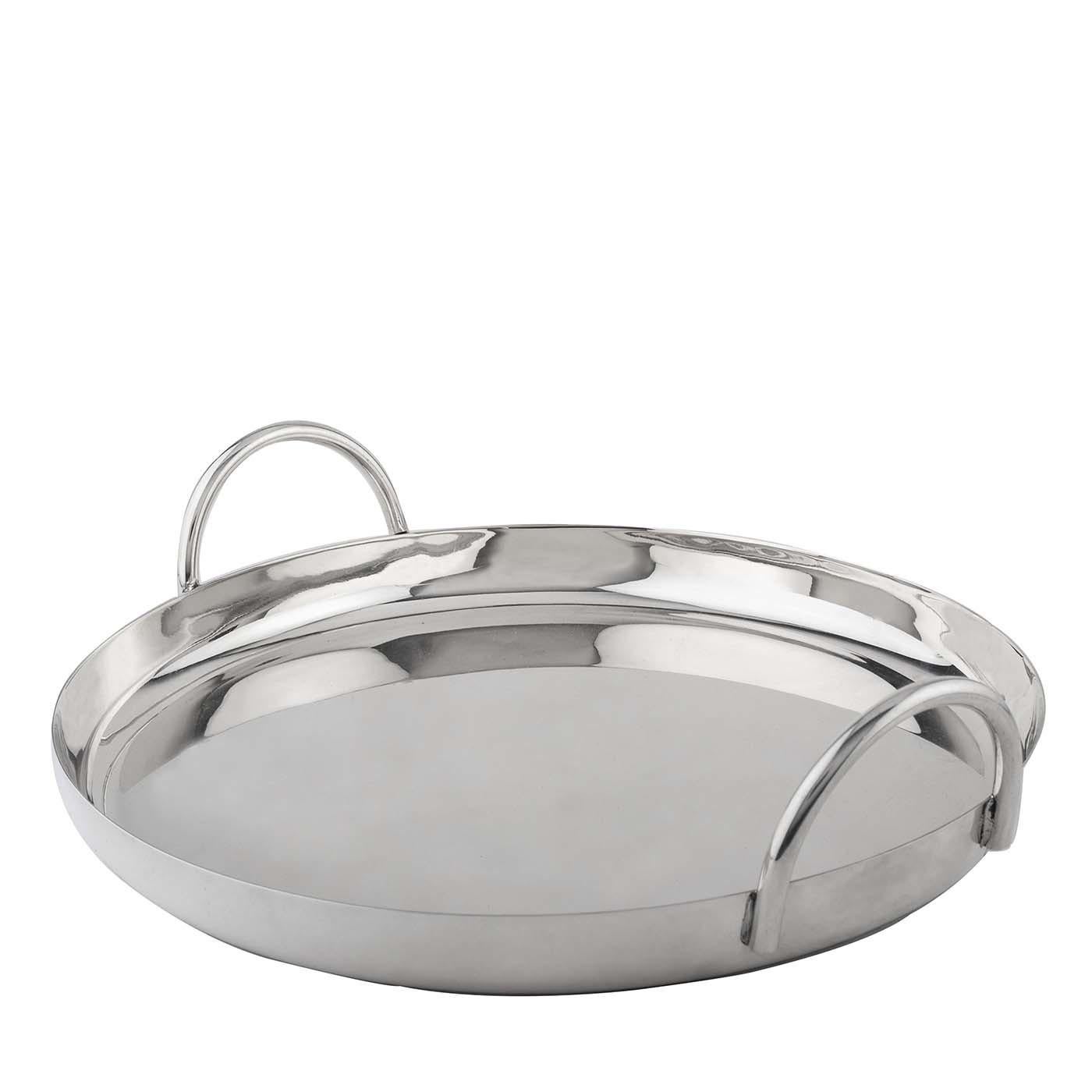 Stunning in its simplicity, this tray's elegant and Classic design is ideal for serving hors d'oeuvres and drinks during parties and festive gatherings. Handmade of 925 silver, it features a tray with a diameter of 27 cm completed with a raised
