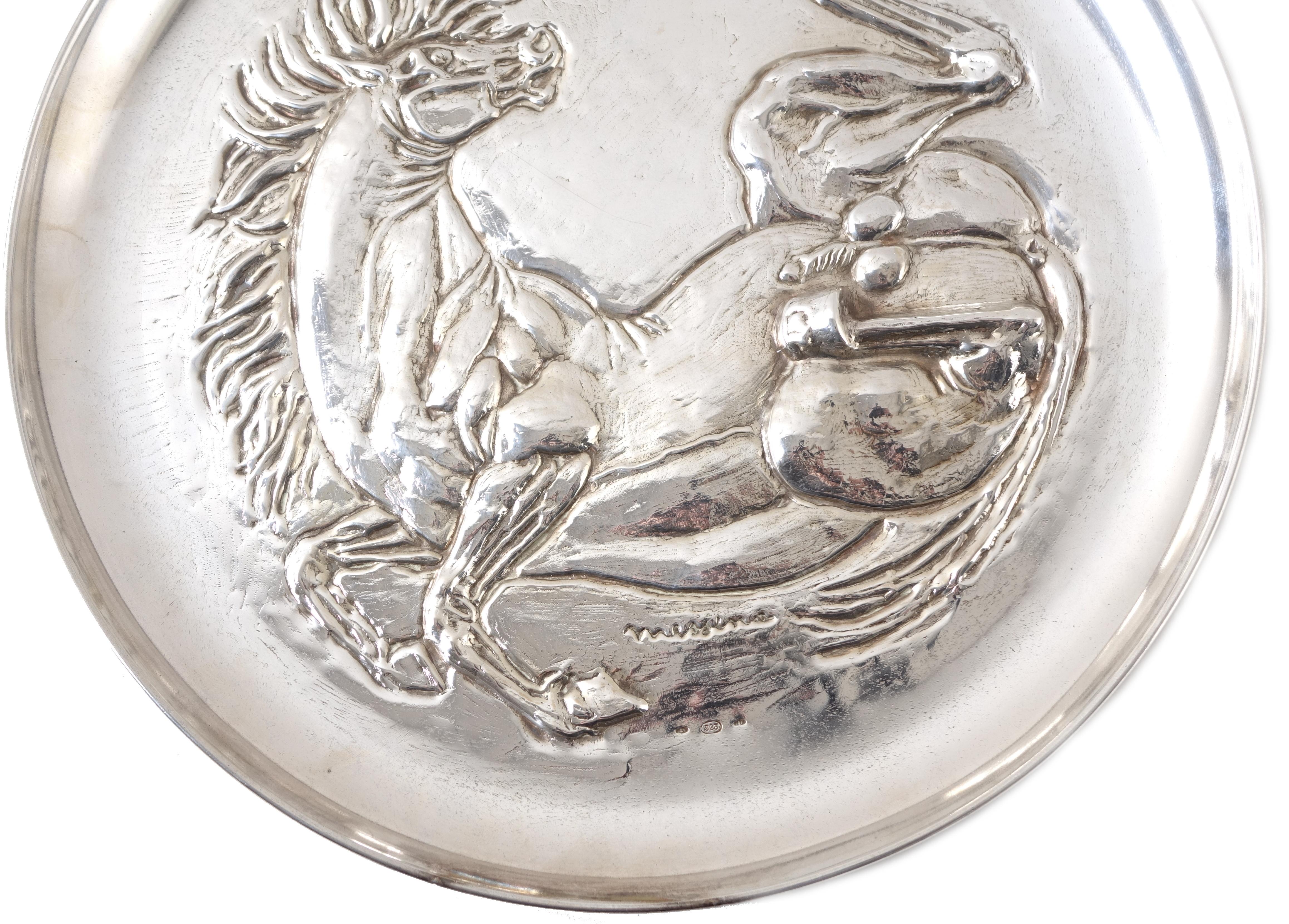 This silver was given by Messina to one of our customers who told us he had
received from the hands of Messina with the phrase it will bring good luck to those who own it ...
Sculptor Francesco Messina was born on 15 December 1900 in Linguaglossa,