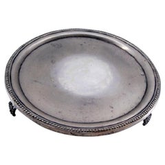 Silver tray w/ a smooth bottom, pearly frieze & resting on three cut-out feet