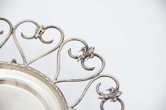 Silver tray with fleur-de-lis details