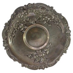 Silver tray with floral reliefs, scrolls surrounding a monogram card