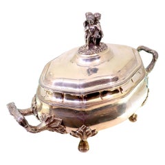 Silver tureen with engravings, friezes, acanthus handles 
claw feet