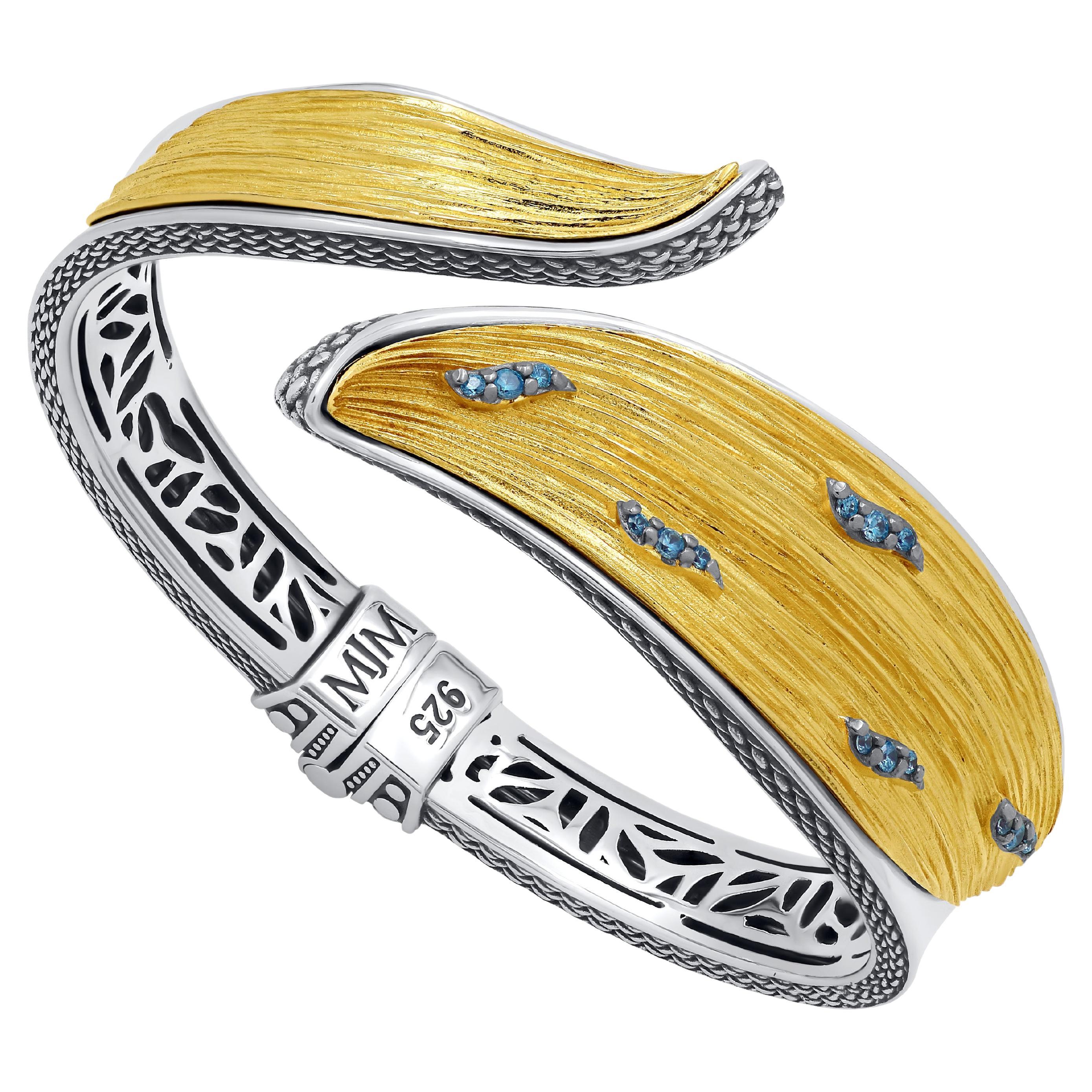 Silver Two Tone Bangle Bracelet with Blue Topaz For Sale