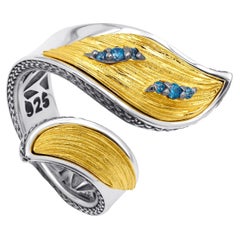 Silver Two Tone Ring with Blue Topaz
