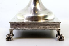 Silver urn with engraved sections, knobbed lid & claw-footed base