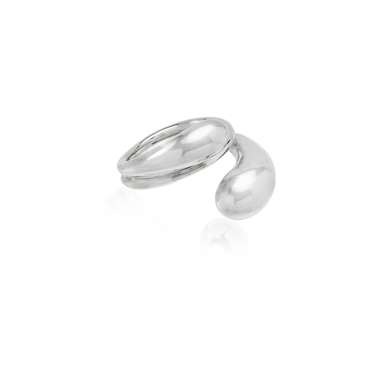 Two delicate water drops play together around the finger in this handmade sterling silver ring. A beautiful, dynamic collection that evokes the movement of the body. Created to form a stunning musical score on the skin, it honors the essential