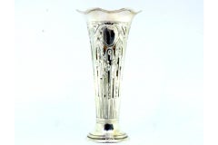 Silver vase with floral motifs suspended around monogram cards and wavy edges