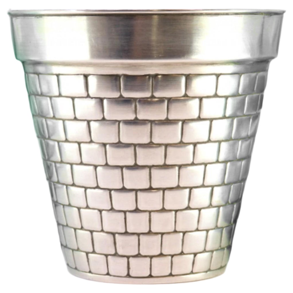 Silver vase with mural-effect reliefs and frills on the edge For Sale