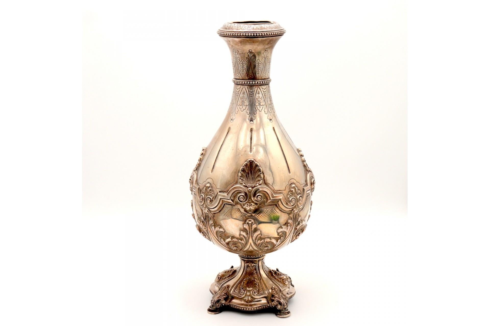 Silver vase with shell reliefs