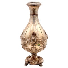 Silver vase with shell reliefs