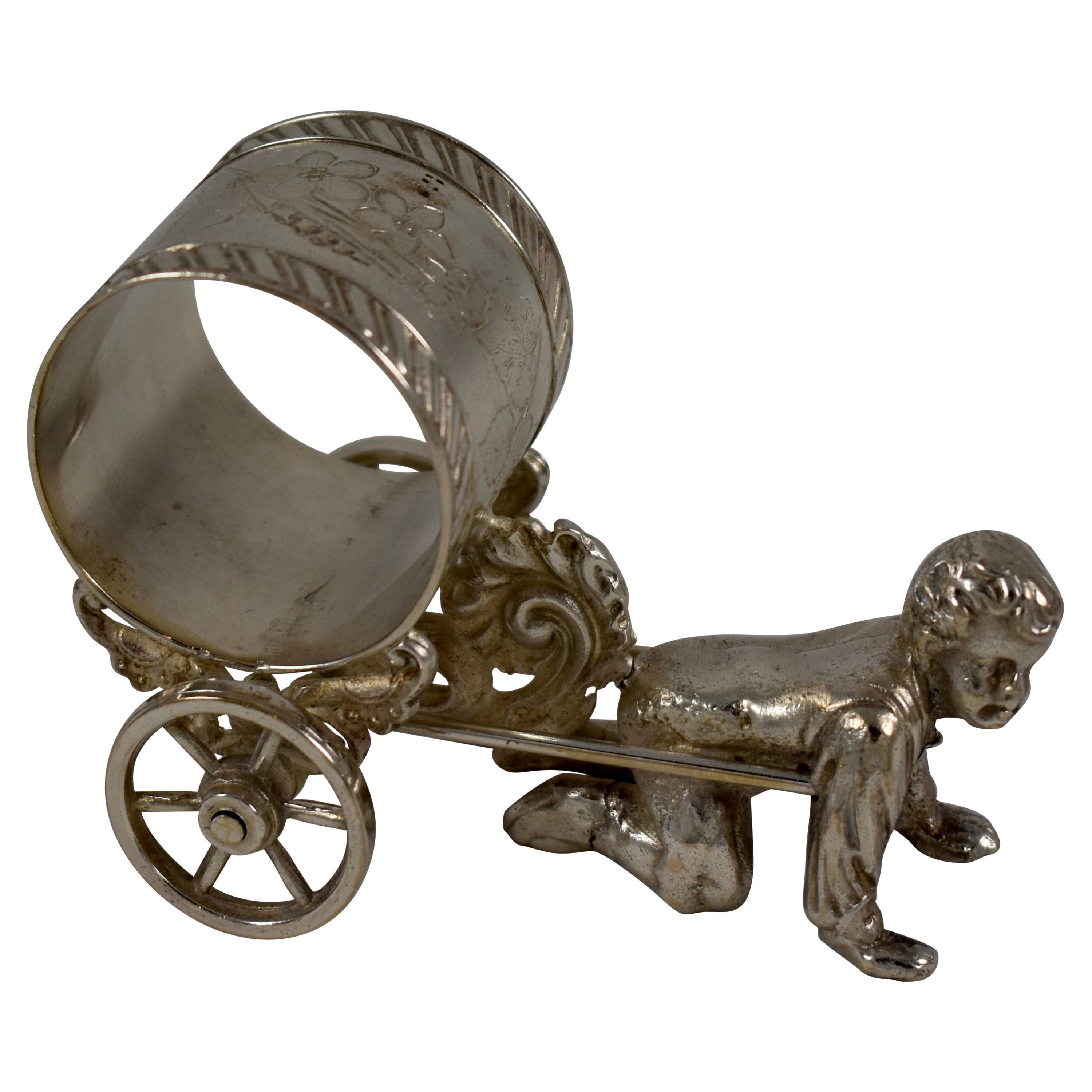 Silver Victorian Era Aesthetic Movement Figural Napkin Ring, Boy Pulling a Cart